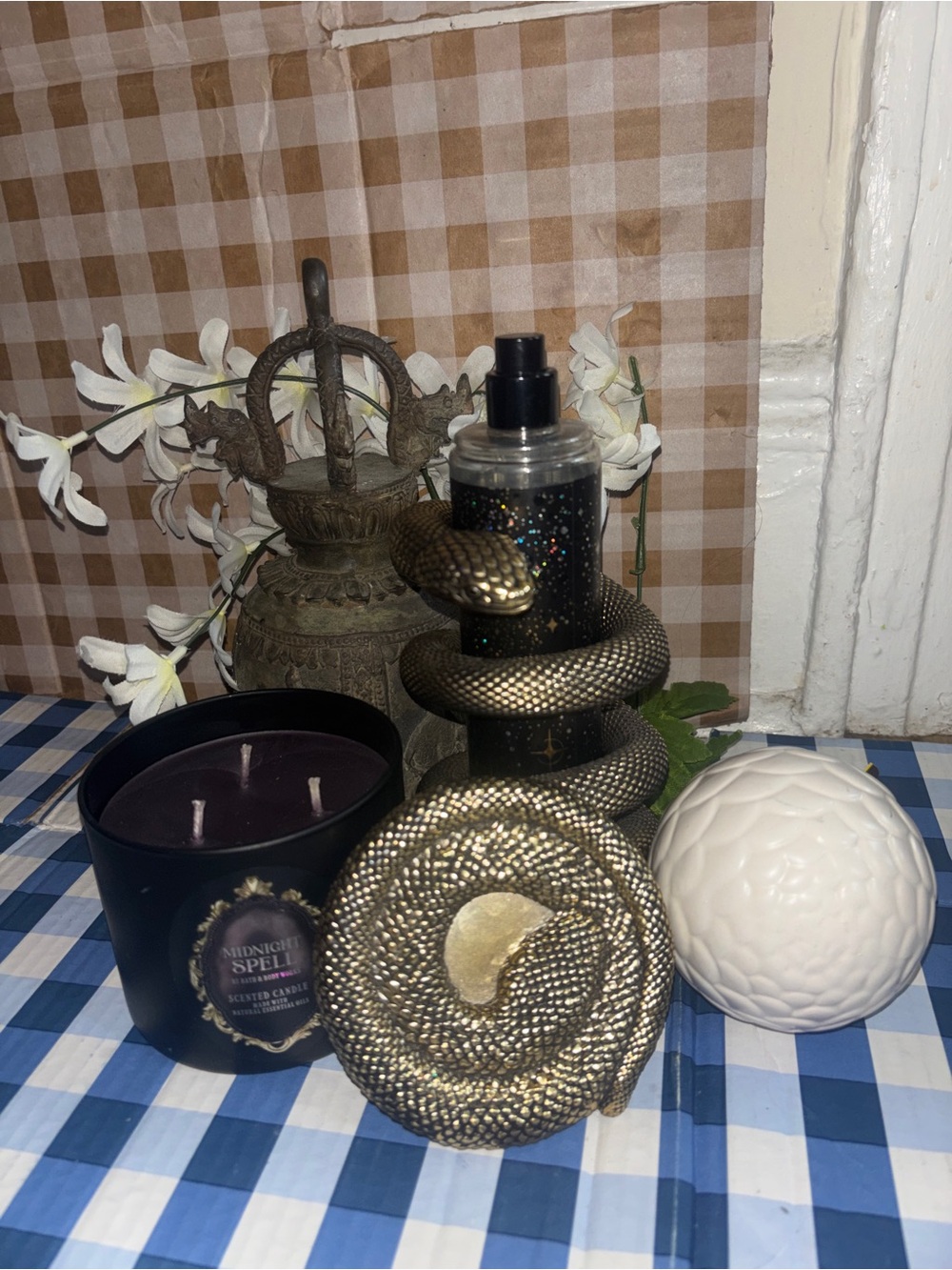 Bath and body Works midnight spell candle, and snake fragrance holder